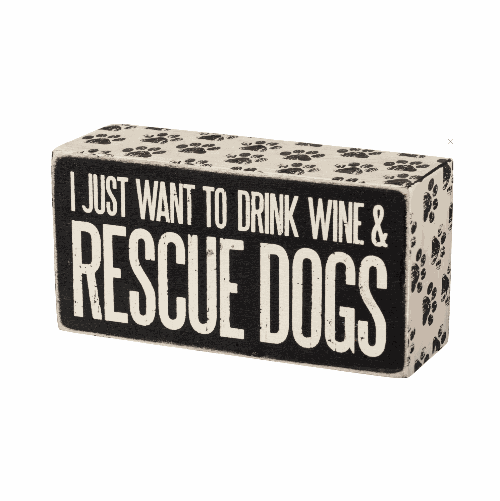 Decorative black box with white text 'I just want to drink wine & rescue dogs' 